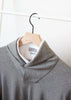 Men's long sleeve shawl collar in grey, layered over white button down. Easy layering with no bulk